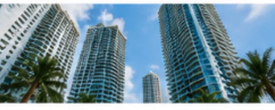 Modern Miami condominium towers against the skyline
